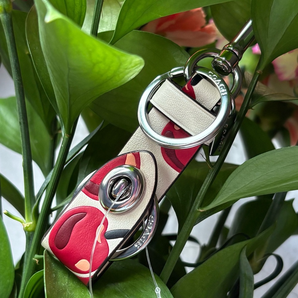 Coach cherry snap trigger key valet bag charm white red black silver